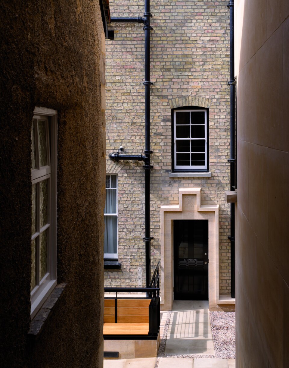 View along passage to new stone door at Corpus Christi College Cambridge