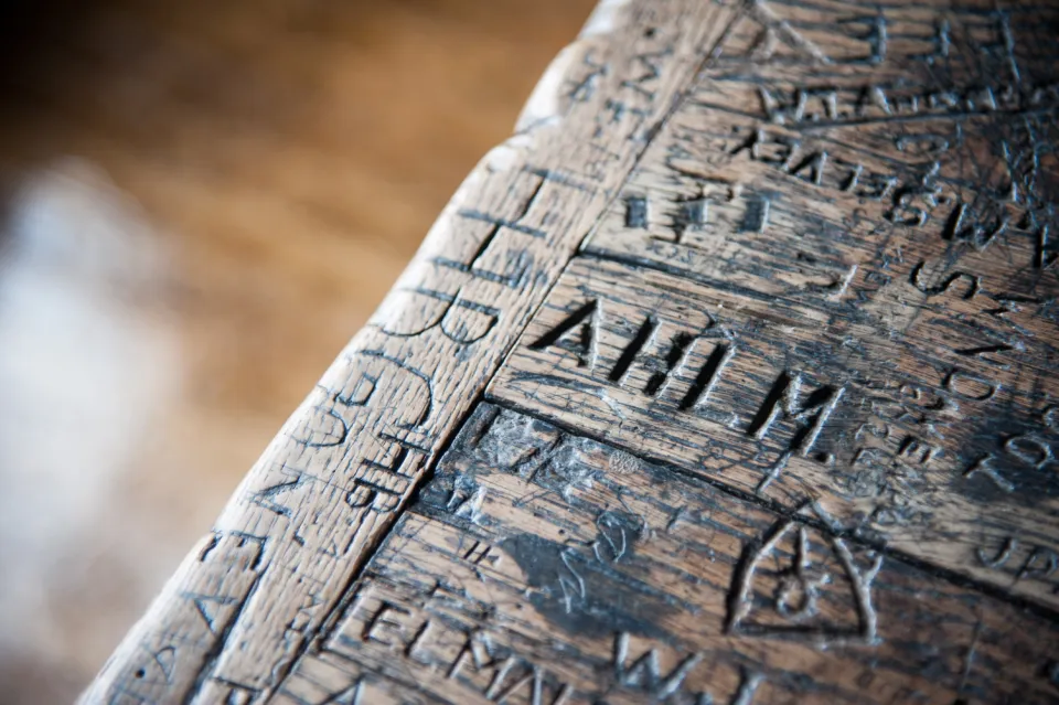 Historic desk graffiti at Shakespeare's School