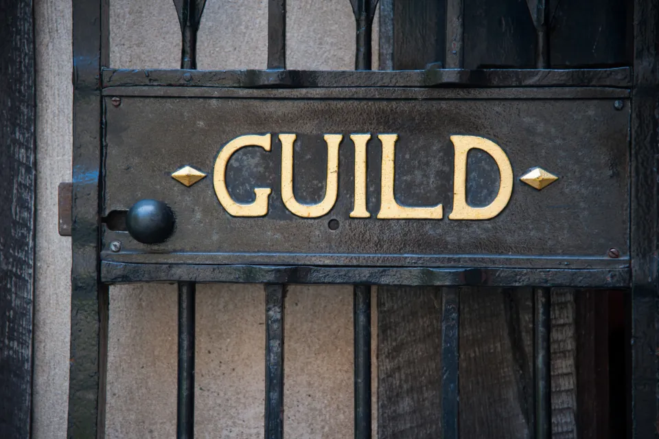 Shakespeare's School 'Guild' sign in gold