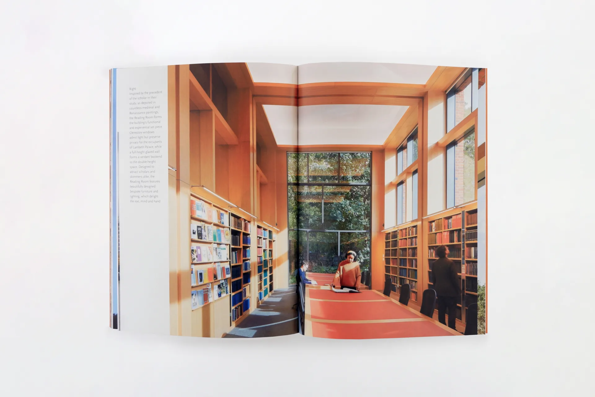 Inside spread of a book with an image of the reading room at Lambeth Palace Library